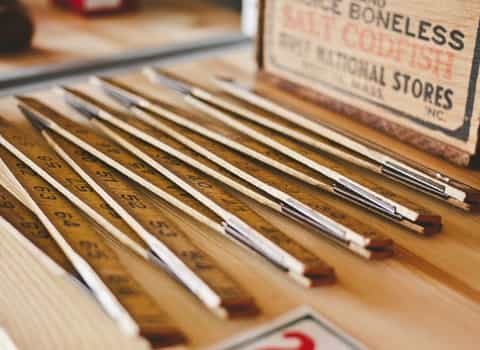 Wooden ruler on the table.